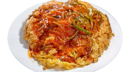 Sweet and sour crispy fried egg with shredded veg
